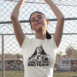 Teen girl wearing t-shirt with 'I sing the body bacteria' by Pat Mills & Ade Hughes